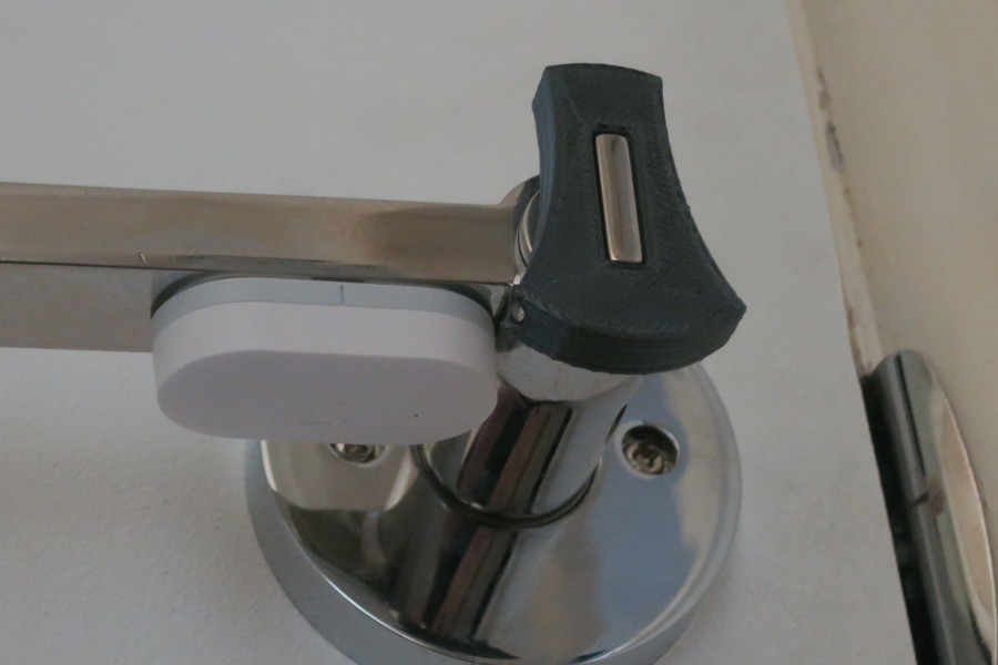 Thumb turn mount attached to a locked door