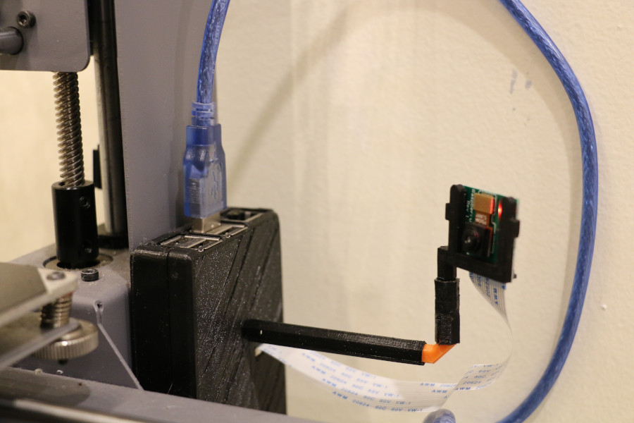 A Raspberry Pi running Octopi mounted on the 3D printer